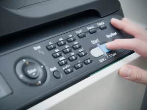 person-operating-a-copier-machine